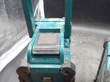 two tools sitting next to each other on a table