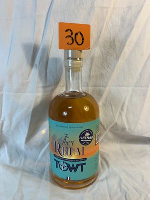 a bottle of liquor that is sitting on a table