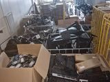 many boxes of assorted electronic equipment in a warehouse