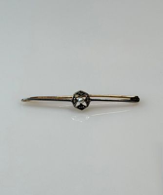 an image of a black and white diamond ring on a white surface