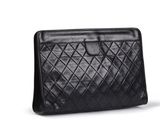 chanel black quilted leather clutch bag