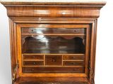 an old wooden desk with drawers and drawers on top of it