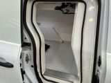 a white van with the door open and a black handle