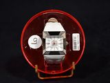 a watch that is sitting on top of a red object