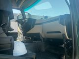 a truck with a hard hat and hard hat in the back of it
