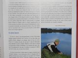 a book with a picture of a man fishing in the water
