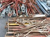 a pile of old rusty metal items on the ground