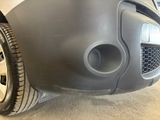 a close up of the front bumper of a car