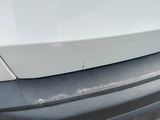 a close up of a car ' s front bumper