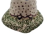 a white hat with a blue and white design on it