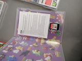 a purple case with a picture of a book on it