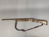 a rifle with a wooden handle on a white background