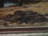 a painting of a man standing on a beach near a body of water