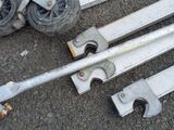 a lot of tools laying on the ground next to each other