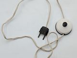 a white light that is plugged in to a cord