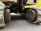 an image of a truck with a flat tire on the road