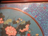 a picture of a painting of flowers on a blue background
