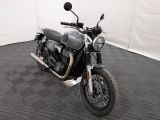 a motorcycle that is parked on the floor in a room