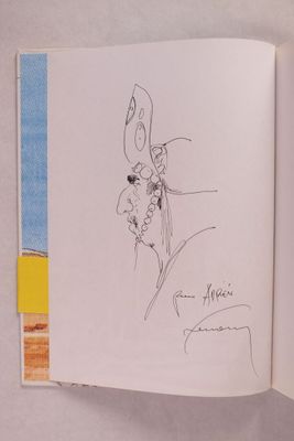 un livre ouvert dont la couverture est ornée d'un dessin représentant un lapin