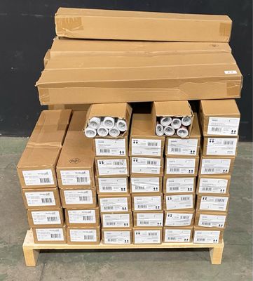 several boxes and packages stacked on top of each other on a pallet