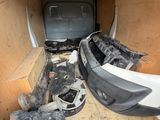 a van that has been vandalized and is in the process of being repaired