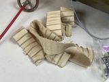 a bunch of pieces of fabric on a table