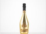 a bottle of champagne sitting on top of a table