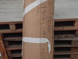 a cardboard box with tape wrapped around it sitting on a pallet