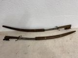 pair of antique japanese samurai swords with wooden handles