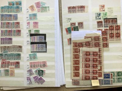 a lot of stamps on the pages of a book