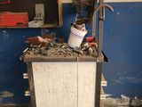an image of a workbench in a garage with tools on it