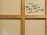 a picture of a window with writing on it