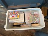 a plastic container filled with assorted candys and candies