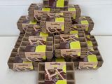 many boxes of chocolates stacked on top of each other