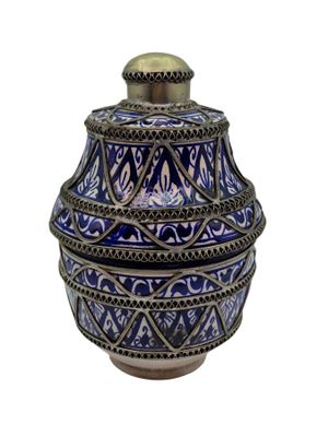 an image of a blue and white vase with a lid