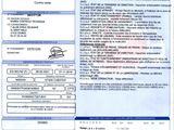 a close up of a document with a picture of a car on it