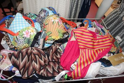 a basket full of underwear on a table in a room