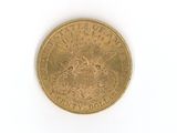 an image of a gold coin on a white surface