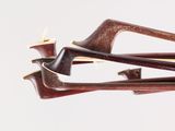 a close up of a pair of scissors on a white surface
