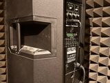 an image of a sound booth with a speaker in it