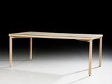 an image of a wooden table with a glass top on a white surface