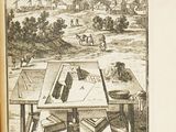 an old book with a picture of a man sitting at a table