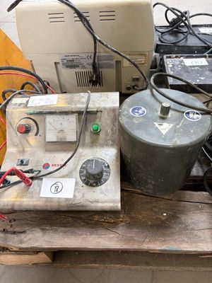 a lot of electrical equipment sitting on a pallet