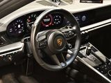 the interior of a car with a steering wheel, dashboard and gauges