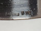 an image of a close up of a knife on a table