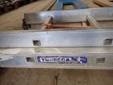 a truck bed with a number plate on it in a warehouse