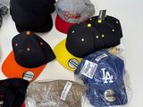 a lot of hats that are on a table