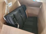 two suitcases in a box that are sitting in the box