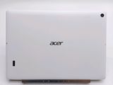 a close up of the back of a white laptop computer