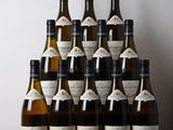 le nombre de bouteilles de vin posées sur une table